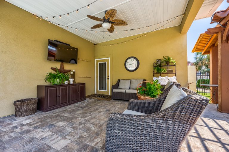 Sand Dune covered lounging area with an outdoor TV