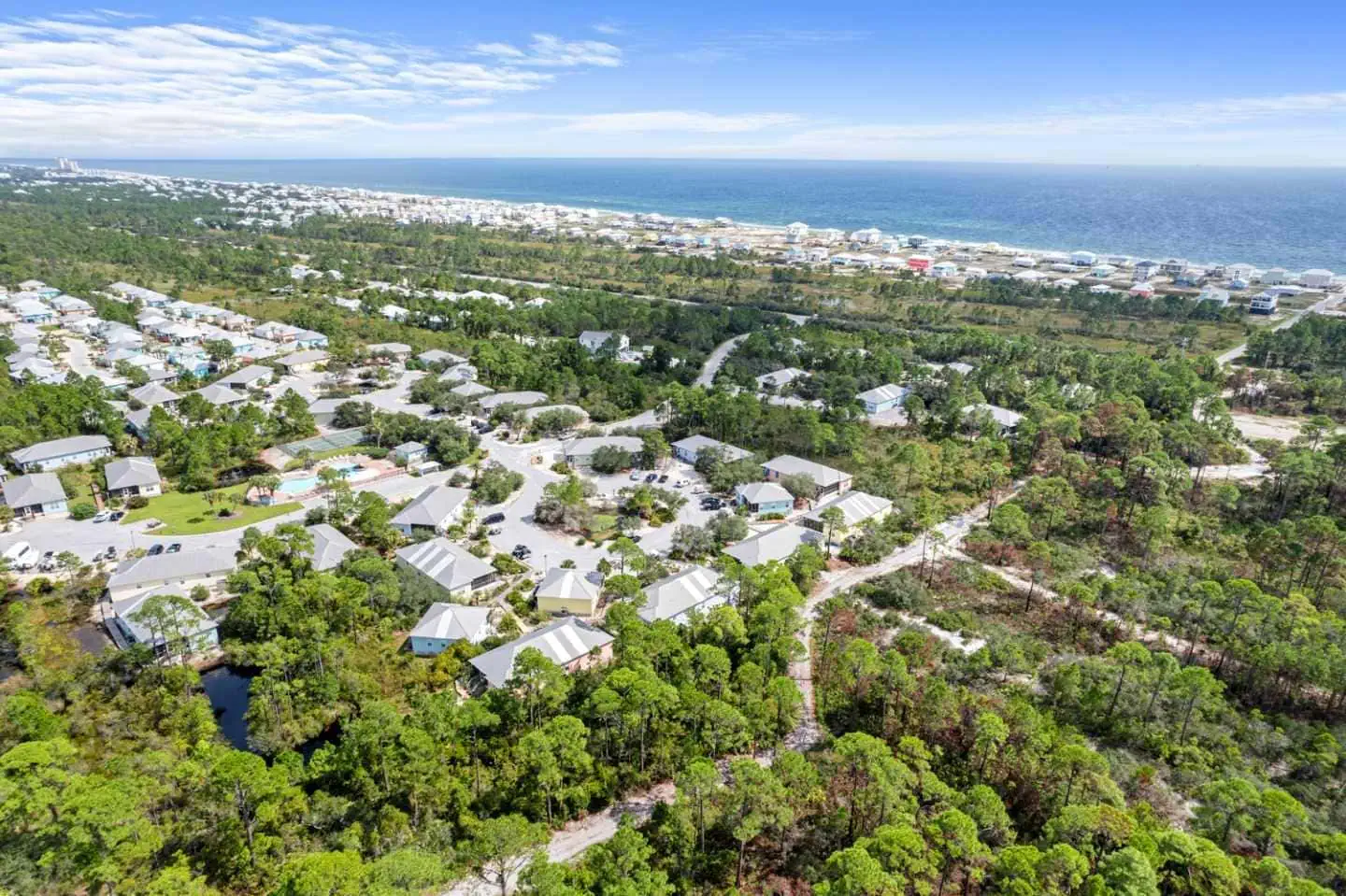Aerial view of Gulf Shores, Alabama coastal community and beach access.