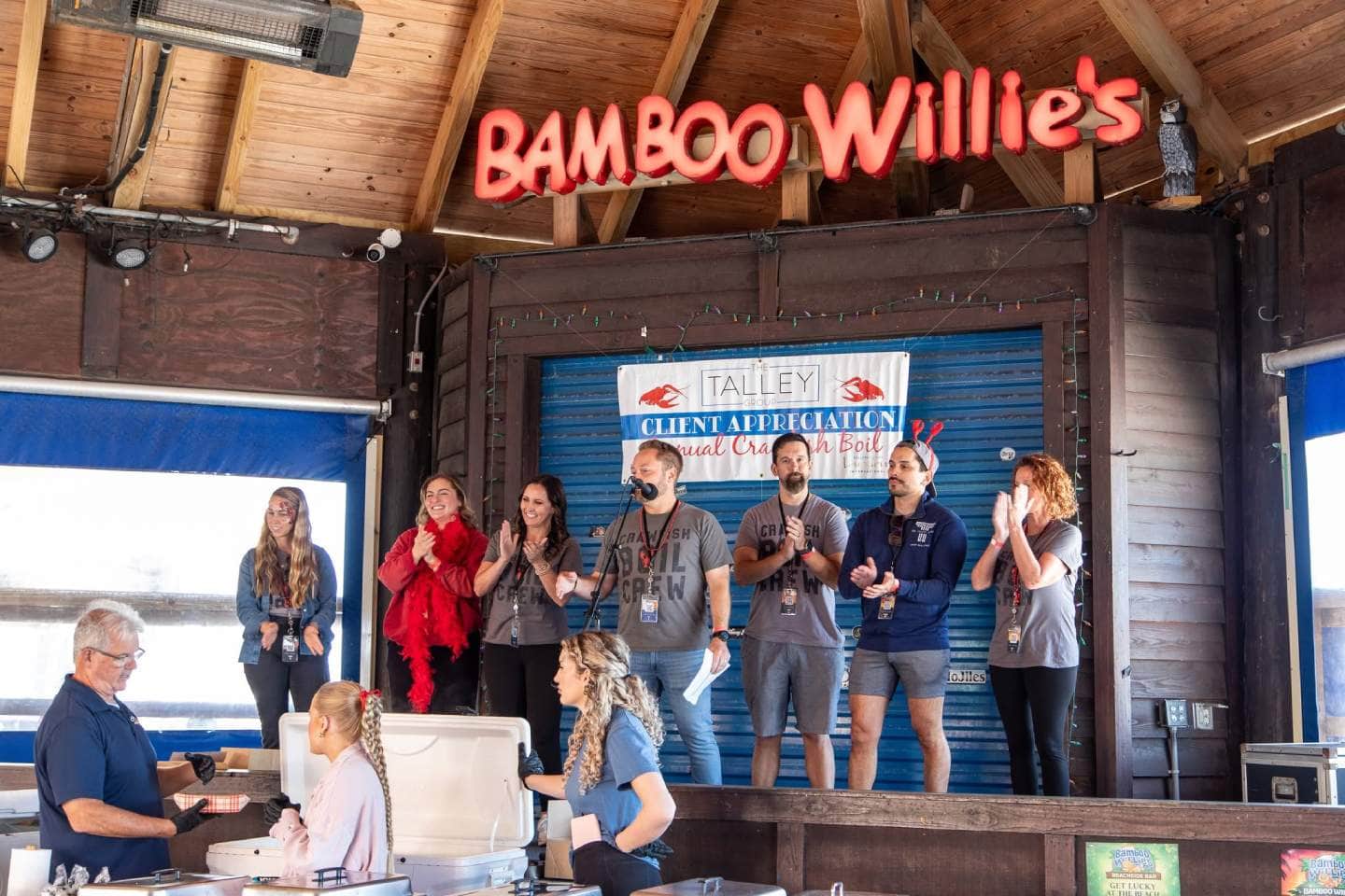 The Talley Group real estate team celebrating client appreciation at Bamboo Willie's in Gulf Breeze, FL.