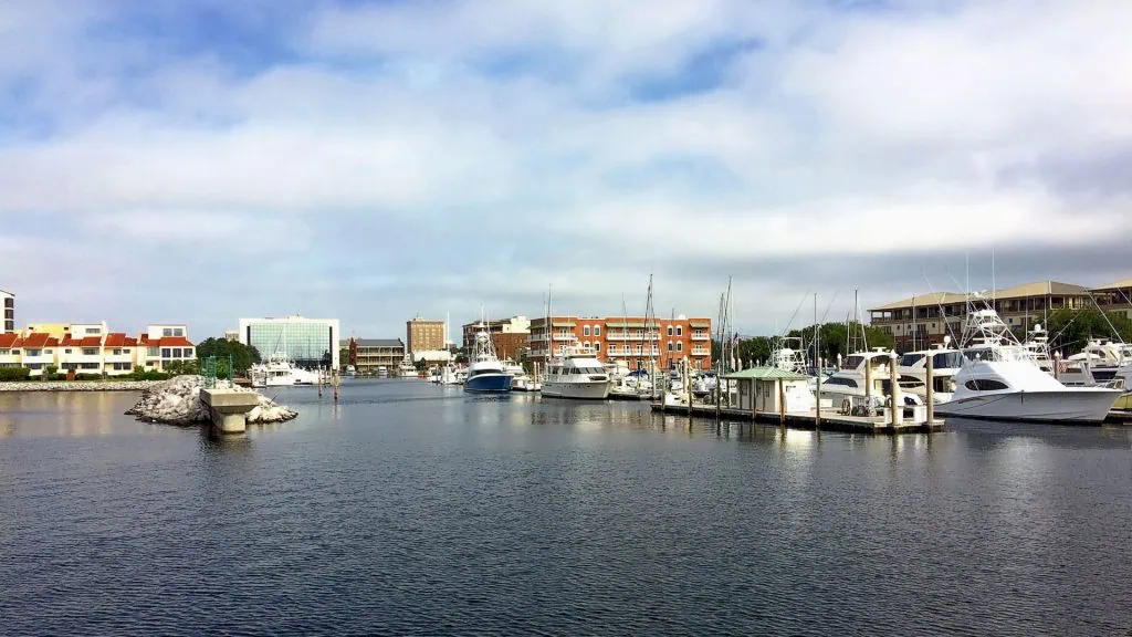 Pensacola waterfront scene and marina with boats, reflecting Gulf Coast lifestyle.